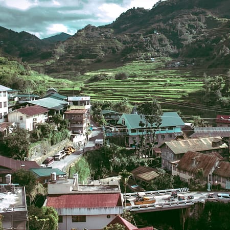 aerial photo of houses near hill