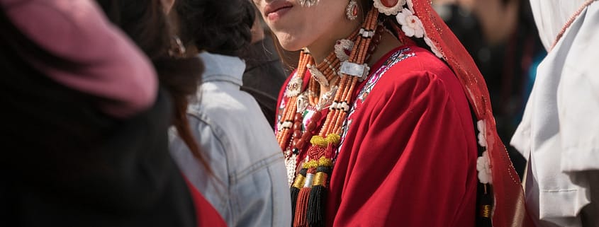group of people with headdresses